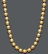 Illuminate your neckline with perfect pearls in rich, warm hues. Necklace features a single strand of golden cultured South Sea pearls (9-11 mm) with a 14k gold clasp. Approximate length: 18 inches.