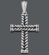 Express your faith in Celtic-inspired design. This remarkable cross pendant features a unique, braided design. Crafted in stainless steel with matching ball chain. Approximate length: 24 inches. Approximate drop width: 1-1/2 inches. Approximate drop length: 2-1/10 inches.