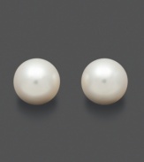 Simple pearl studs to add a drop of sophistication. These timeless earrings feature white south sea pearls (9-10 mm) set in 14k gold. Approximate diameter: 1/3 inch.