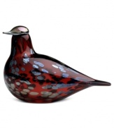 A red body combined with a silver head and markings makes iittala's ruby bird among the prettiest in the flock. First hatched in 1972 by artist Oiva Toikka, the fanciful Birds collection captures the nuances of each creature in beautiful mouth-blown glass.