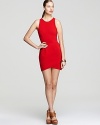 Cut a curve-defining silhouette in this Dolce Vita mini dress, imbued in a standout fiery hue.