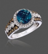 Don't be shy with your style -- make a statement! This vibrant ring by Le Vian highlights a round-cut blue topaz center stone (2 ct. t.w.) encircled by round-cut white diamonds (1/8 ct. t.w.), with bezel-set white diamonds and round-cut chocolate diamonds (1/3 ct. t.w.) at the shoulders. Crafted in 14k white gold. Size 7.