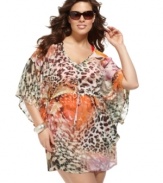 Get wild in J Valdi's plus size cover up. Mixed prints make this tunic a must-have for the beach and pool!