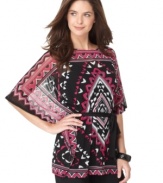 Go bold in a graphic print with this Alfani tunic! It's relaxed shape pairs perfectly over skinny jeans!