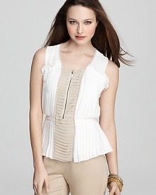 Precise pleating creates a captivating silhouette on this VINCE CAMUTO blouse, rendered in airy chiffon.