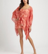 With delicate embroidery, this light-as-air silk coverup is short and definitely sweet.V-neckSelf-tieSilkDry cleanImported