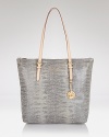 This go-to tote from MICHAEL Michael Kors gets you through your commute with effortless elegance and easy glamour.