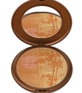 All-over powder bronzer great for face, body and décolleté with a limited edition bamboo design. Inspired by the desert sun and exotic mirages, accents of gold, copper and pink come together for a glowing, sun-kissed complexion. Swirl Powder Brush #1 on the bronzer compact and apply to the top of the forehead, temples, and underneath the cheekbones. Continue to the jawline and on the bridge of the nose. Use Highlight Brush #3 and apply the gold shade portion to the apples of the cheeks for a shimmery glow. A natural, sun-kissed look with sensually luminous and silky skin. Summer 2012 collection.