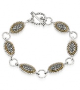 A shapely mix of sparkle and shine. Genevieve & Grace's trendy toggle bracelet features oval-shaped links crafted from sterling silver and 18k gold over sterling silver with glittering marcasite accents. Approximate length: 7-1/2 inches.