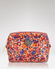 Beauty is in bloom with this printed cosmetics case from Tory Burch, finished with the label's signature logo.