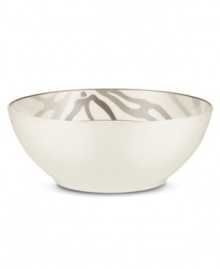 Abstract markings in soft shades of khaki fill in this glazed white bowl for unconventional elegance. Trimmed with matte platinum, its sleek, modern shape looks sharp on casual and formal tables alike. From Noritake's collection of serveware and serving dishes.