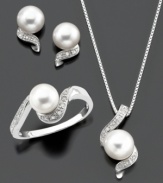 Enjoy style with sparkling fluidity. This jewelry set features round-cut diamond (1/8 ct. t.w.) and cultured freshwater pearl set in sterling silver. Pendant measures approximately 18 inches with a 3/4-inch drop. Earrings measure approximately 1/4 inch. Ring size 7.