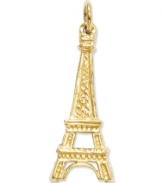 Ooo la la! This iconic charm represents France's world-renowned structure, the Eiffel Tower. Crafted in solid 14k gold. Approximate length: 1-1/10 inches. Approximate width: 2/5 inch.