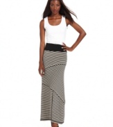 Studio M's maxi skirt is striking with diagonal tiers and a mesmerizing stripe print. A solid foldover waistband grounds the look.