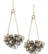 Group dynamic. Silver-colored cherry beads come together in stunning fashion in this pair of teardrop earrings from Kenneth Cole New York. The earrings are crafted from gold-tone mixed metal. Approximate drop: 2 inches.