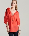 Intricate embroidery at the sleeves lends a luxe bohemian feel to this gauzy Ella Moss tunic.