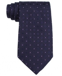 Take an outside of the box approach to business style with the pop of this quilted tie from Club Room.