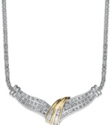 Sparkling elegance. This chic twist necklace shines with the addition of round and baguette-cut diamonds (1/2 ct. t.w.). Set in sterling silver with 14k gold accents. Approximate length: 17 inches. Approximate drop width: 1-3/4 inches. Approximate drop length: 5/8 inch.