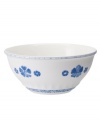 Vintage charm meets modern durability in the Farmhouse Touch vegetable bowl, featuring cornflower-blue laurels and blooms in delicately embossed porcelain from Villeroy & Boch.