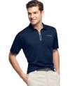 Dry out. Stay comfortable when you're out on the links or just kicking back with this polo shirt from Columbia.