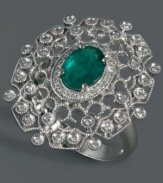 Channel the energy and vibrance of Brasil in this flashy cocktail ring from Brasilica by Effy Collection. A unique filigree setting crafted from 14k white gold cradles an oval-cut emerald (1-1/8 ct. t.w.) and sparkling, round-cut diamonds (1-1/5 ct. t.w.).