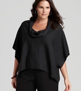 A draped cowl neckline flows into the carefree boxy silhouette of this Eileen Fisher wool sweater, finishing in a tend-right dipped hem.