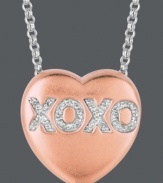 Say it from the heart. Sweethearts' adorable heart-shaped pendant expresses more that just great style with the letters XOXO written in round-cut diamonds (1/10 ct. t.w.) across the surface. Pendant crafted in 14k rose gold over sterling silver and sterling silver. Copyright © 2011 New England Confectionery Company. Approximate length: 16 inches + 2-inch extender. Approximate drop: 5/8 inch.