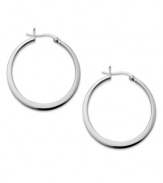 Hoops always do the trick. The perfect add-on for any look, Touch of Silver's click hoops are a must have for every collection. Crafted in silver-plated brass with a sterling silver backing. Approximate diameter: 1 inch.