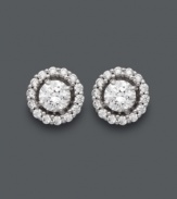 Spectacular sparkle. Arabella's unique stud earrings are out of this world! A luminous Swarovski zirconia center (2-7/8 ct. t.w.) shines extra bright when encircled by a halo of round-cut Swarovski zirconias. Post setting crafted in 14k white gold. Approximate diameter: 5 mm.