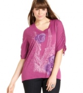 Lend pizzazz to your weekend look with Style&co.'s printed plus size top, finished by a high-low hem.