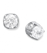 Traditional diamond stud earrings with an intricate twist. Each pair features a bezel-set diamond in the side, as well as a round-cut diamond at front (total 1/2 ct. t.w.). Set in 14k white gold. Approximate diameter: 4-1/10 mm.