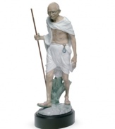 An homage to political activist and revered philosopher Mahatma Gandhi, this elaborate Lladro collectible depicts the historic figure in artfully glazed porcelain.