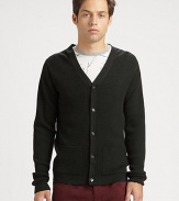 A classic waffle-knit cardigan made from impeccable virgin wool and featuring convenient patch pockets.V-neckLong sleevesElbow-patch detailsButton frontPatch pocketsVirgin woolDry cleanImported