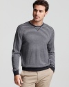 With its tonal ministripe pattern and elbow patch accents, this soft merino wool sweater is a subtle way to add texture to your cold-weather look.