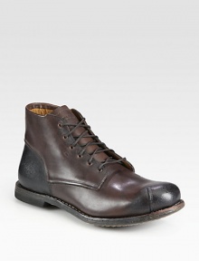 A finely crafted chukka boot that exudes a rugged sensibility, this lace-up design, constructed from rich leather features a burnished, two-toned detail for an edgy finish.Leather upperLeather liningPadded insoleLeather sole/rubber heelImported