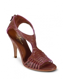 Stand tall in a hand-stained leather sandal with braided jute and signature woven detail. From Cole Haan.