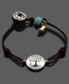 Breathe life into your style with this vintage leather bracelet by Fossil. Mixed metal charms include a tree and a bird. Button closure with logo. Approximate length: 7-1/5 inches.