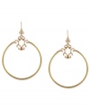 Understated elegance. Jessica Simpson's circular drop earrings are crafted from gold-tone mixed metal with a patterned design for a stylish touch. Approximate drop: 3-1/4 inches.