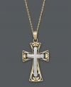 Cherish your faith in extraordinary design. This intricate cross pendant features an ornate, filigree pattern in 14k gold and 14k white gold. Approximate length: 18 inches. Approximate drop width: 1/2 inch. Approximate drop length: 1 inch.