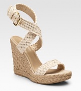 A crocheted ankle-strap design with leather details and roped, rural-inspired wedge.Roped wedge heel, 4¾ (120mm) Roped platform, 1¼ (30mm) Compares to a 3½ heel (90mm) Open toe Adjustable strap with buckle Cotton upper Leather lining Padded insole Rubber sole Made in SpainOUR FIT MODEL RECOMMENDS ordering true size.. 