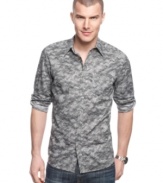 An all over snake print on this shirt from Kenneth Cole New York adds some safari style to your casual look.