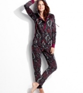 Warm and snuggly from head to toe. Kensie's hooded jumpsuit features contrasting cuffs and placket with a snap closure.