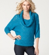 A chunky sweater with a lush cowl neckline is a wardrobe essential, from Calvin Klein Jeans. (Clearance)