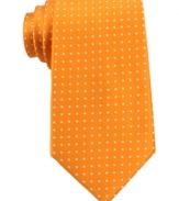 Get spotted. With a citrus punch, this Tommy Hilfiger tie gives your work wardrobe a fresh update.