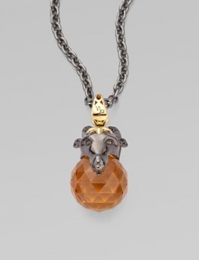 A goldplated and black rhodium plated sterling silver creature, complete with pavé black cubic zirconia, looms over a topaz crystal, strung on a long elegant chain.Topaz crystal Cubic zirconia Goldplated sterling silver Black rhodium plated sterling silver Chain length, about 30 Pendant width, about 1½ Lobster clasp Imported