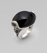 From the Kali Pebble Collection. A dramatic oval of smooth black chalcedony perches within a sterling silver setting sprinkled with pavé black sapphires in a smooth silver band.Black sapphire and black chalcedonySterling silverWidth, about 1¼Imported