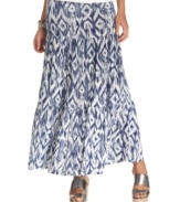 A two-tone ikat print makes a fresh statement on Cha Cha Vente's tiered maxi skirt. Complete the look with metallic sandals for a glam-meets-boho look.