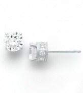 Diamond stud earrings have never sparkled so bright. This unique style features a round-cut diamond at center with a row of round-cut diamonds in the post (1-1/2 ct. t.w.). Four-prong setting crafted in 14k white gold. Approximate diameter: 4-2/5 mm.