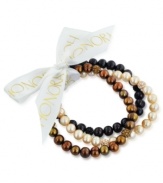 Beauty in bunches. Brown plays a starring role in this set of three cultured freshwater pearl (7-8 mm) stretch bracelets that offer a classic chic feel, with crystals adding luster. Approximate length: 7-1/2 inches.