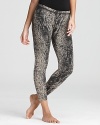 Punch up your workout with these python-print Hard Tail pants, cut in a chic cropped silhouette.